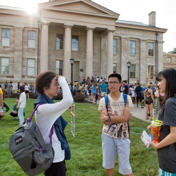 ARH, the Herky C.A.R.E.S. Project, University of Iowa Student Government, and International Student and Scholar Services held the 2nd annual ice cream social for both domestic and international students on Sunday, August 16th, 2015 on the Pentacrest. (Justin Torner/The University of Iowa)